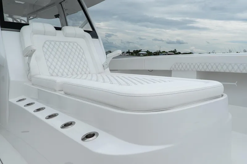 Slide: The Image of Luxurious seating on 2026 Front Runner 37 Catamaran, featuring elegant white upholstery. - 12