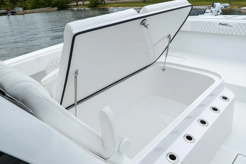 Slide: The Image of 2026 Front Runner 37 Catamaran with open storage compartment on deck. - 14