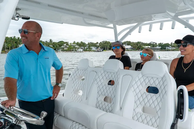 Slide: The Image of People enjoying a ride on a 2026 Front Runner 37 Catamaran. - 18