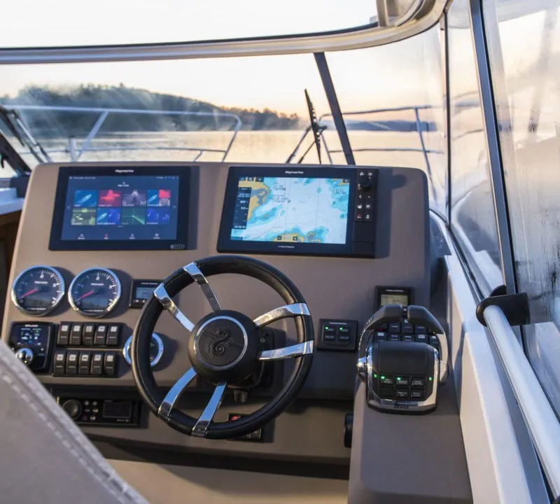 Slide: The Image of 2025 Marex 360 Cabriolet Cruiser dashboard with modern navigation and control systems. - 22