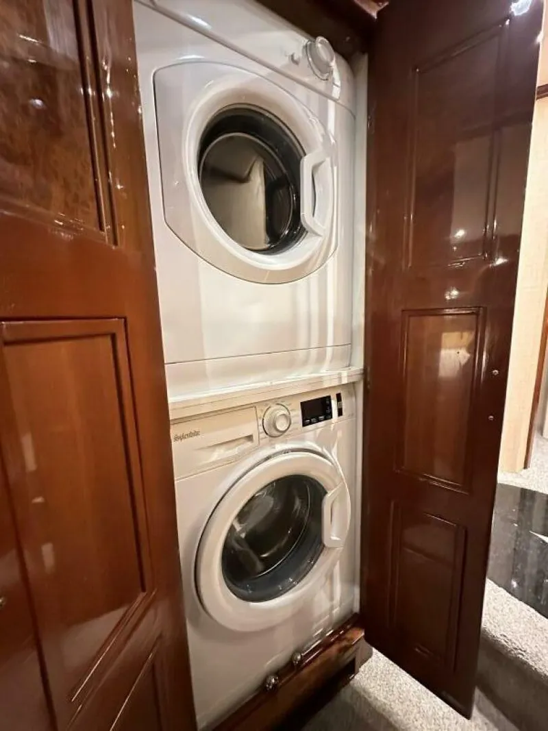 Slide: The Image of Stacked washer and dryer in 2006 Marquis Flybridge Motor Yacht. - 19