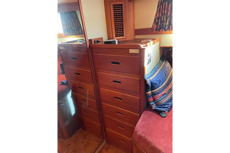 Slide: The Image of Interior of 1991 Grand Banks 46 Motoryacht with cozy seating and wooden accents. - 13