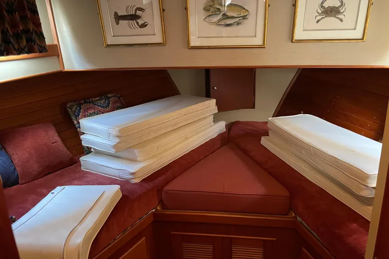 Slide: The Image of 1991 Grand Banks 46 Motoryacht kitchen with sink, stove, and wooden cabinetry. - 15