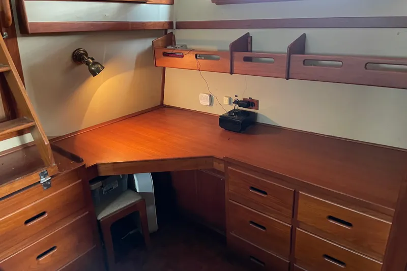 Slide: The Image of Bathroom interior of 1991 Grand Banks 46 Motoryacht with sink, toilet, and floral decor. - 23