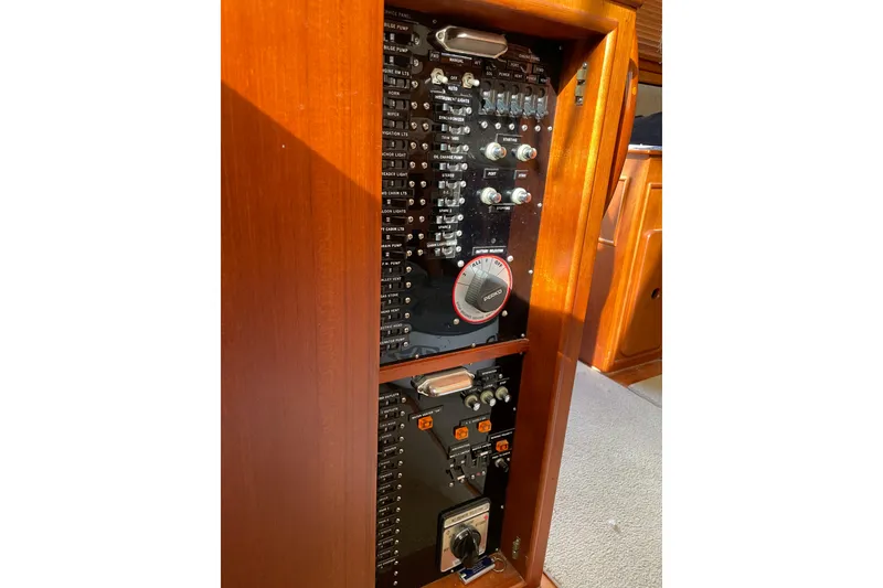 Slide: The Image of Laundry area in 1991 Grand Banks 46 Motoryacht with washer, dryer, and fire extinguisher. - 27