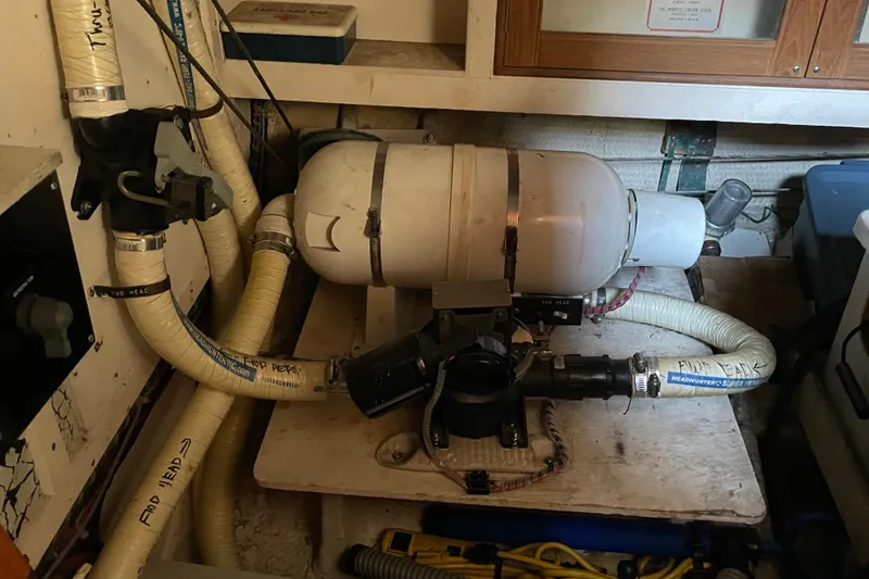 Slide: The Image of Wooden helm and gauges of a 1991 Grand Banks 46 Motoryacht. - 37