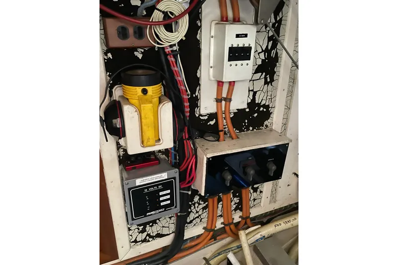 Slide: The Image of Control panel of 1991 Grand Banks 46 Motoryacht with gauges and switches. - 39