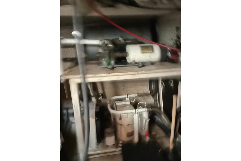 Slide: The Image of Bathroom interior of 1991 Grand Banks 46 Motoryacht with sink and floral decor. - 40