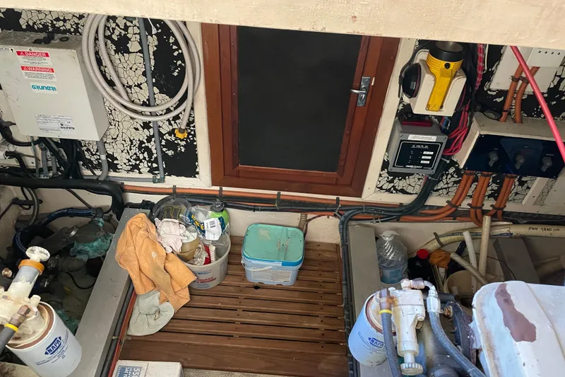 Slide: The Image of Electrical panel and wiring inside a 1991 Grand Banks 46 Motoryacht. - 46