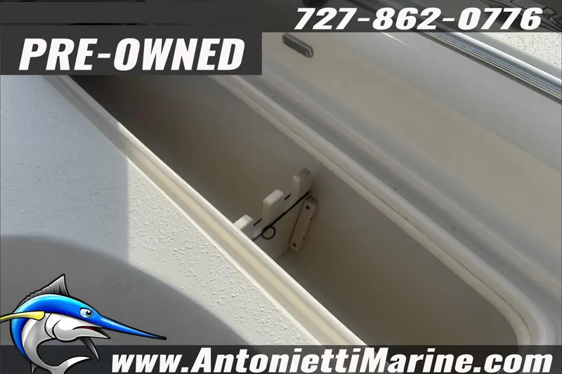 Slide: The Image of Pre-owned 2020 Sea Chaser 23 LX boat storage compartment, Antonietti Marine contact details. - 12