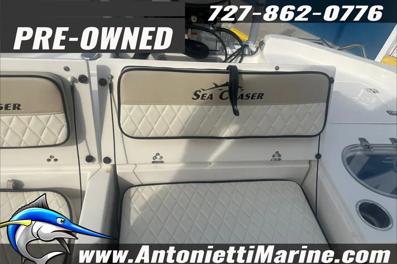 Slide: The Image of Pre-owned 2020 Sea Chaser 23 LX boat interior with diamond-stitched seating. - 17