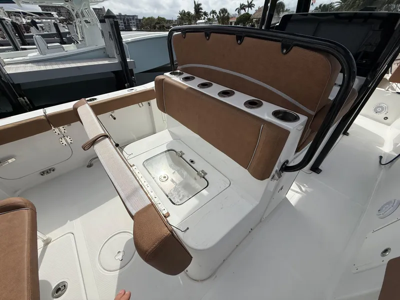 Slide: The Image of 2023 Sea Hunt Gamefish 30 boat interior with forward seating and storage compartments. - 15