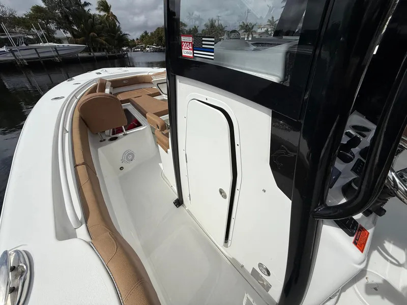 Slide: The Image of 2023 Sea Hunt Gamefish 30 Forward Seating boat with sleek design and spacious interior. - 6