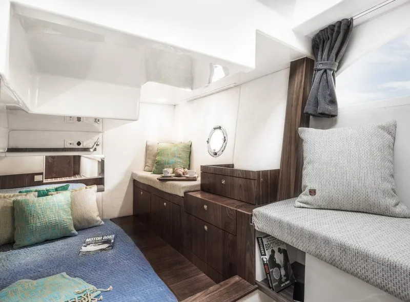 Slide: The Image of Luxurious interior of 2025 Marex 375 yacht with cozy seating and elegant decor. - 31