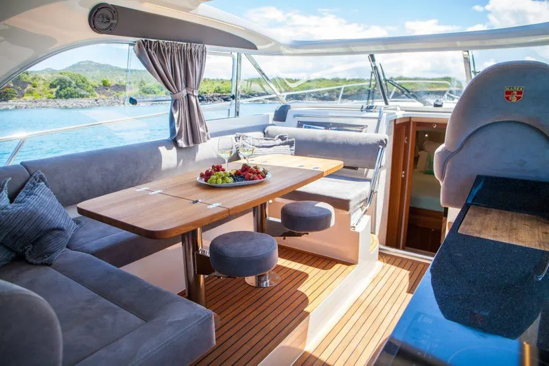 Slide: The Image of Luxurious interior of 2025 Marex 375 yacht with elegant dining area and scenic views. - 32