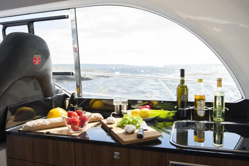 Slide: The Image of Luxurious Marex 375 yacht kitchen with fresh ingredients and ocean view, 2025 model. - 20