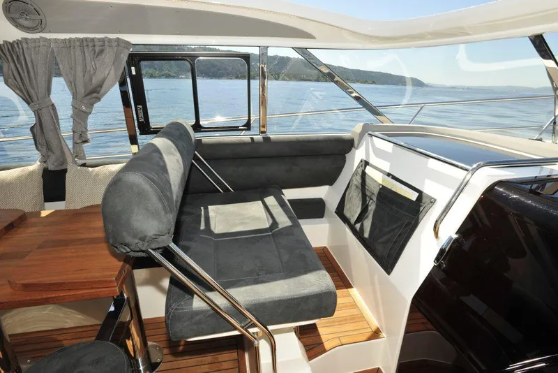 Slide: The Image of Interior of 2025 Marex 375 yacht with sleek seating and panoramic windows. - 28