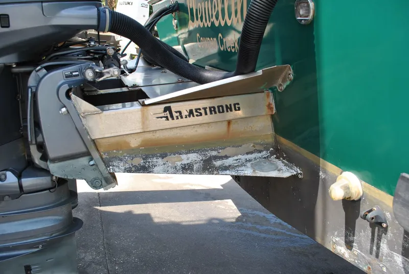 Slide: The Image of 1987 Halter 31 Lafitte Skiff with Armstrong bracket and outboard motor detail. - 21