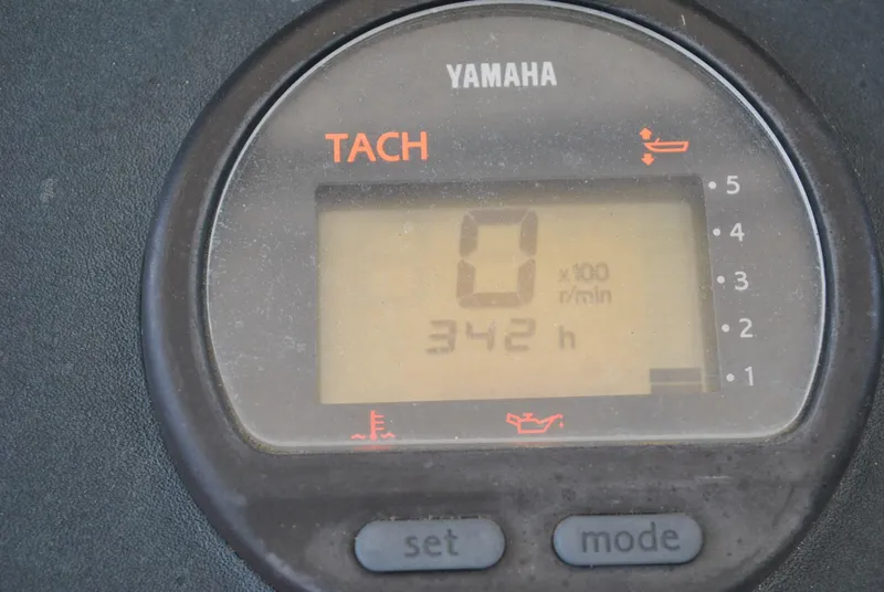 Slide: The Image of Yamaha tachometer displaying 342 hours on a 1987 Halter 31 Lafitte Skiff. - 24