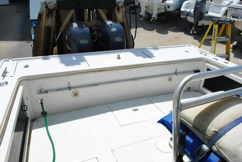 Slide: The Image of 1987 Halter 31 Lafitte Skiff boat deck with dual 150 horsepower engines. - 29