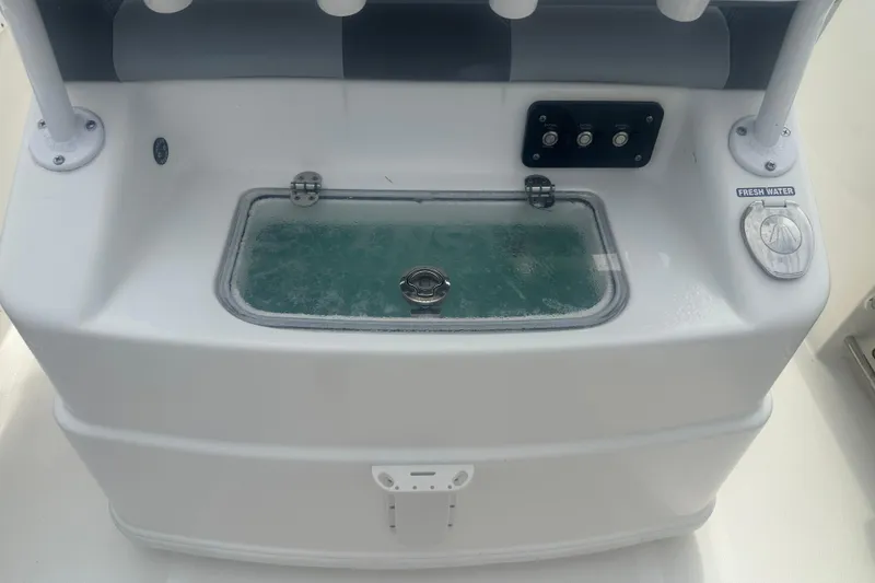 Slide: The Image of 2023 NauticStar 2602 Legacy boat livewell with fresh water controls. - 41