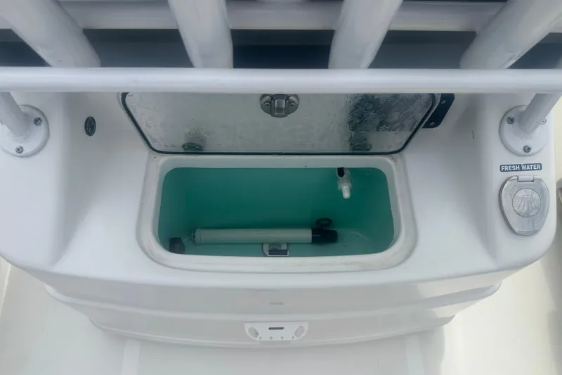 Slide: The Image of 2023 NauticStar 2602 Legacy boat livewell with fresh water access. - 42
