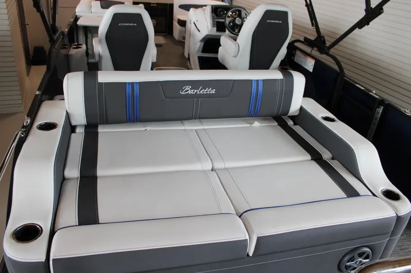 Slide: The Image of 2025 Barletta Corsa 23UC boat interior with luxurious seating and modern design. - 14
