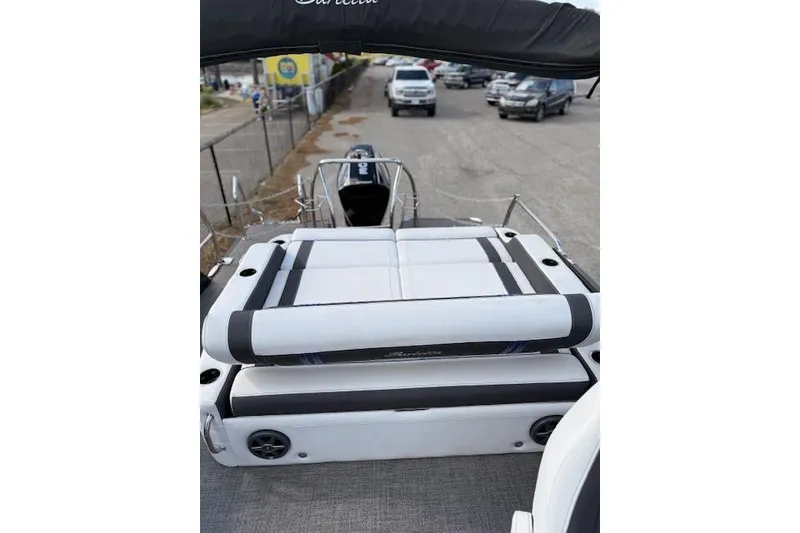 Slide: The Image of 2025 Barletta Corsa 23UC boat with sleek seating and modern design. - 24