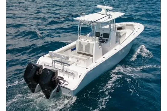 Slide: The Image of 2026 Front Runner 33 Center Console boat, showcasing sleek design and rod holders. - 4