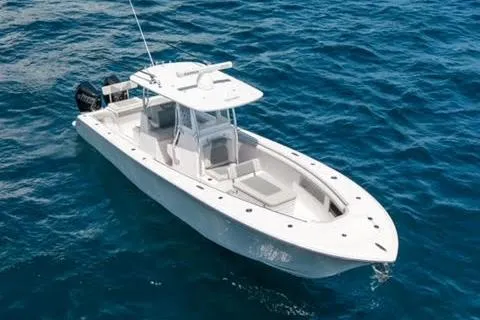 Slide: The Image of 2026 Front Runner 33 Center Console boat interior with seating and storage compartments. - 5