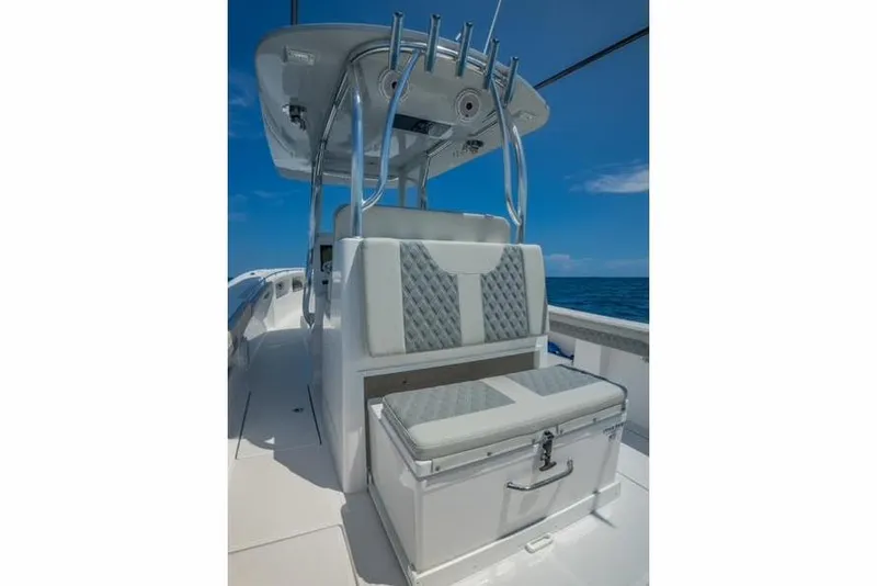 Slide: The Image of 2026 Front Runner 33 Center Console boat with storage compartment and cooler. - 7