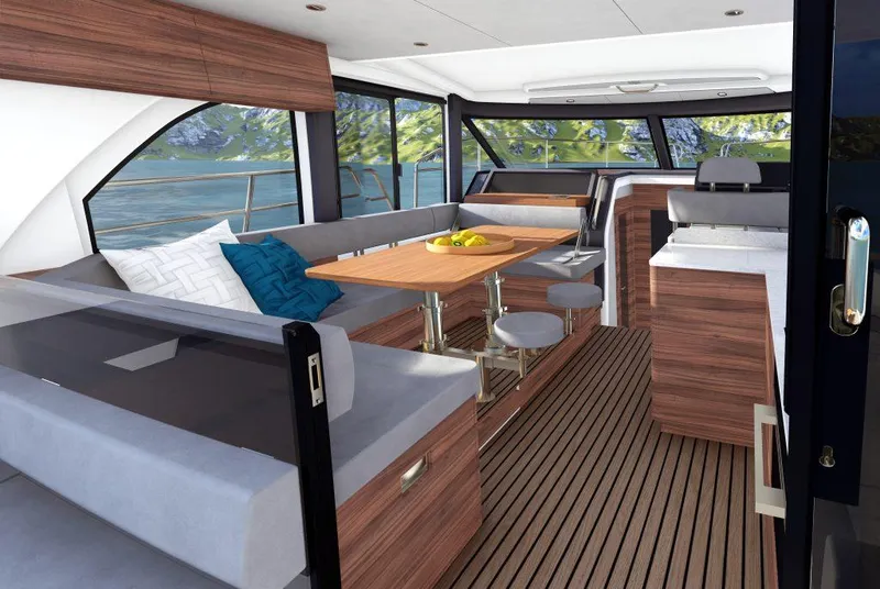Slide: The Image of 2025 Marex 440 Scandinavia yacht interior with modern seating and dining area. - 7