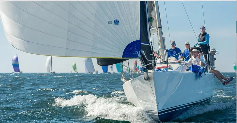 Slide: The Image of Sailing J Boats J/111, 2013 model, racing on open water with crew. - 2