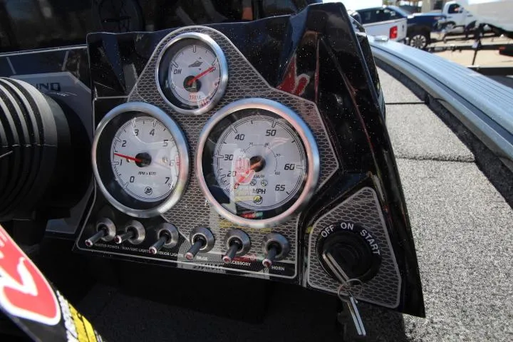 Slide: The Image of Dashboard of 2025 Lund 1875 Pro-V Bass XS boat with gauges and ignition. - 6