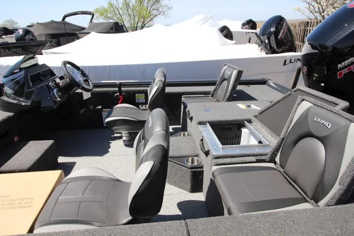 Slide: The Image of 2025 Lund 1875 Pro-V Bass XS interior with seating and console features. - 7