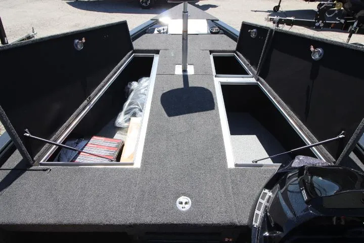Slide: The Image of 2025 Lund 1875 Pro-V Bass XS boat interior with open storage compartments. - 8