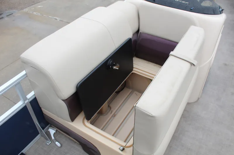 Slide: The Image of 2019 Sun Tracker Fishin' Barge 22 DLX with open storage compartment. - 15