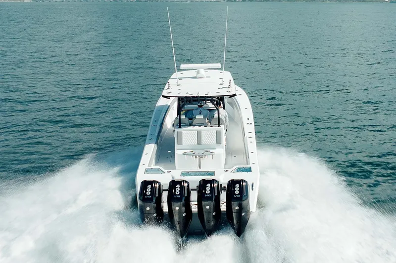 Slide: The Image of 2026 Front Runner 39 Center Console boat interior with white seating and cup holders. - 11