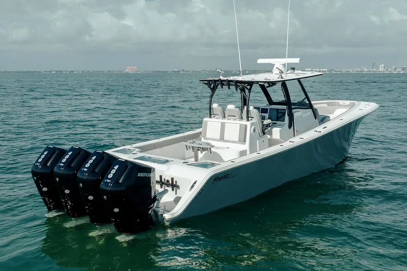 Slide: The Image of 2026 Front Runner 39 Center Console boat interior with seating and storage compartments. - 14