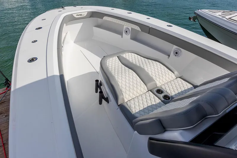 Slide: The Image of 2026 Front Runner 39 Center Console boat interior with open storage compartments. - 18