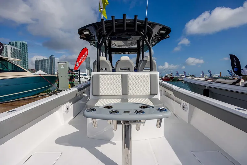 Slide: The Image of Luxurious seating on 2026 Front Runner 39 Center Console boat under blue sky. - 20