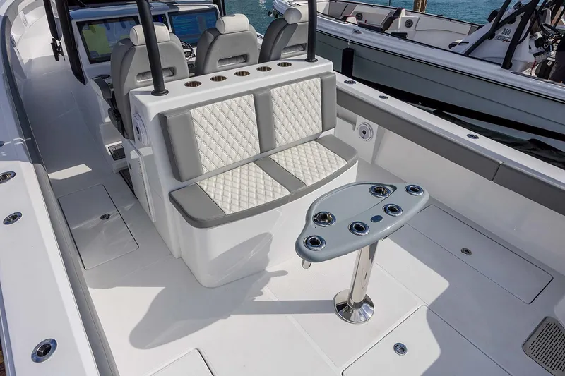 Slide: The Image of 2026 Front Runner 39 Center Console boat dashboard with modern navigation equipment. - 27