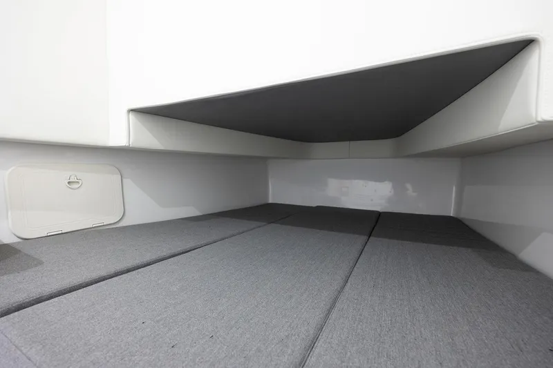 Slide: The Image of 2026 Front Runner 39 Center Console boat with sleek white seating and modern design. - 29