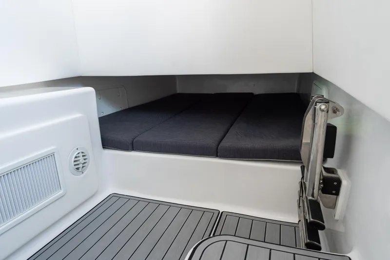 Slide: The Image of Interior cabin of 2026 Front Runner 39 Center Console boat with cushioned seating. - 32
