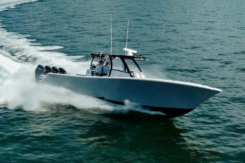Slide: The Image of 2026 Front Runner 39 Center Console boat with logo and engine detail. - 6