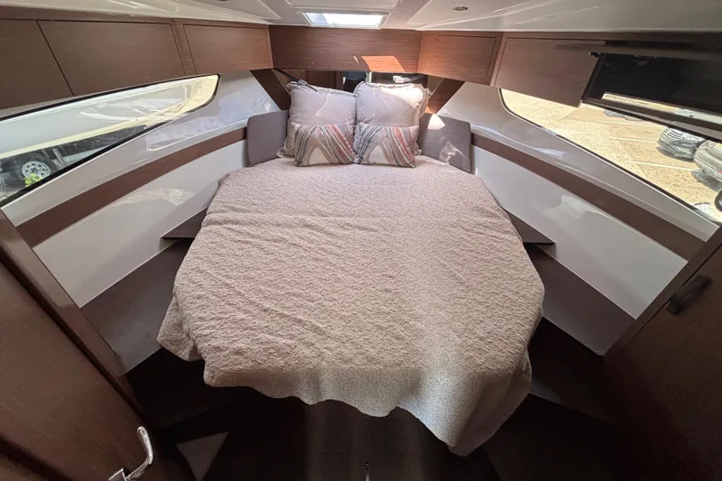 Slide: The Image of Luxurious cabin interior of 2026 Beneteau Antares 11 Fly with cozy bedding. - 19