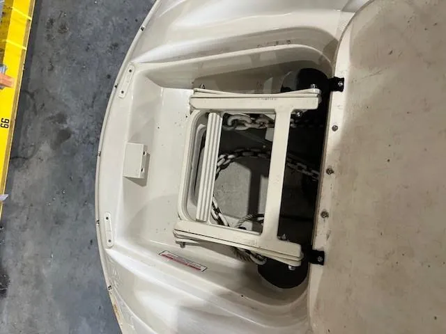 Slide: The Image of 2006 Sea Ray Sundeck 240 boat ladder and anchor storage area. - 22