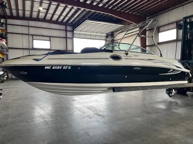 Slide: The Image of 2006 Sea Ray Sundeck 240 boat in indoor storage facility. - 3