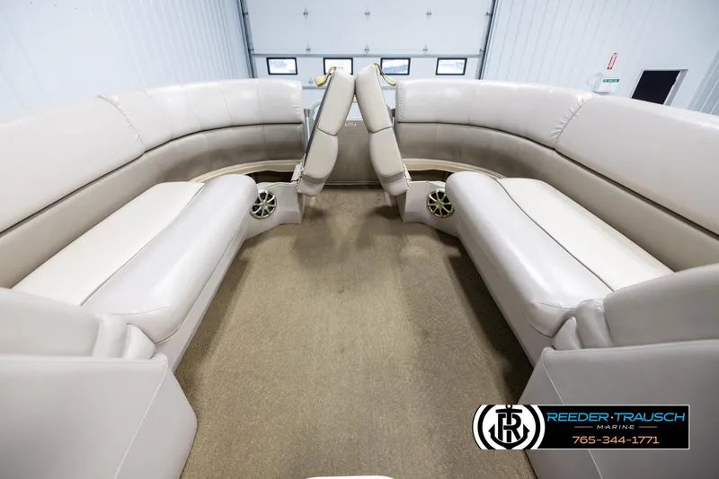 Slide: The Image of Interior of 2013 Bennington 2375 GCW pontoon boat with beige seating and carpet. - 21