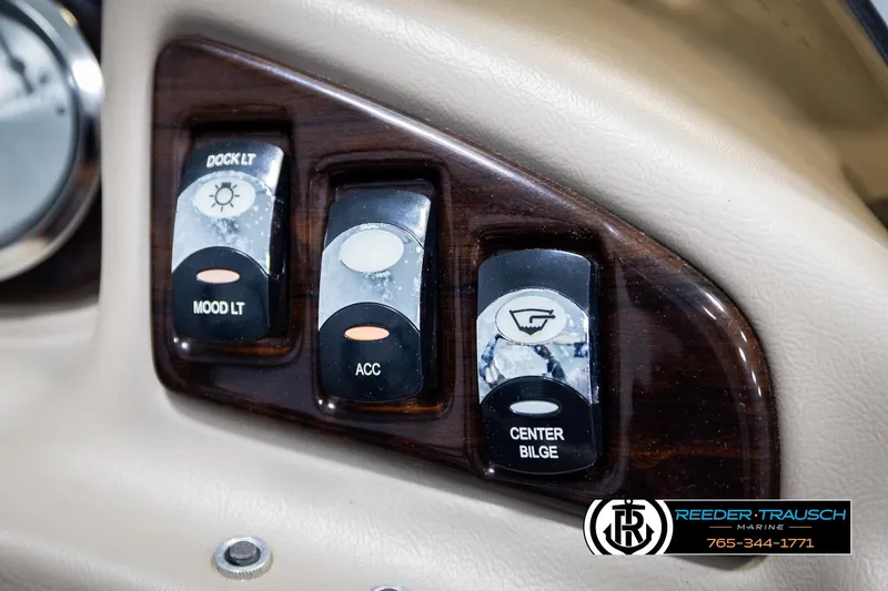 Slide: The Image of Control panel of a 2013 Bennington 2375 GCW boat with labeled switches. - 36
